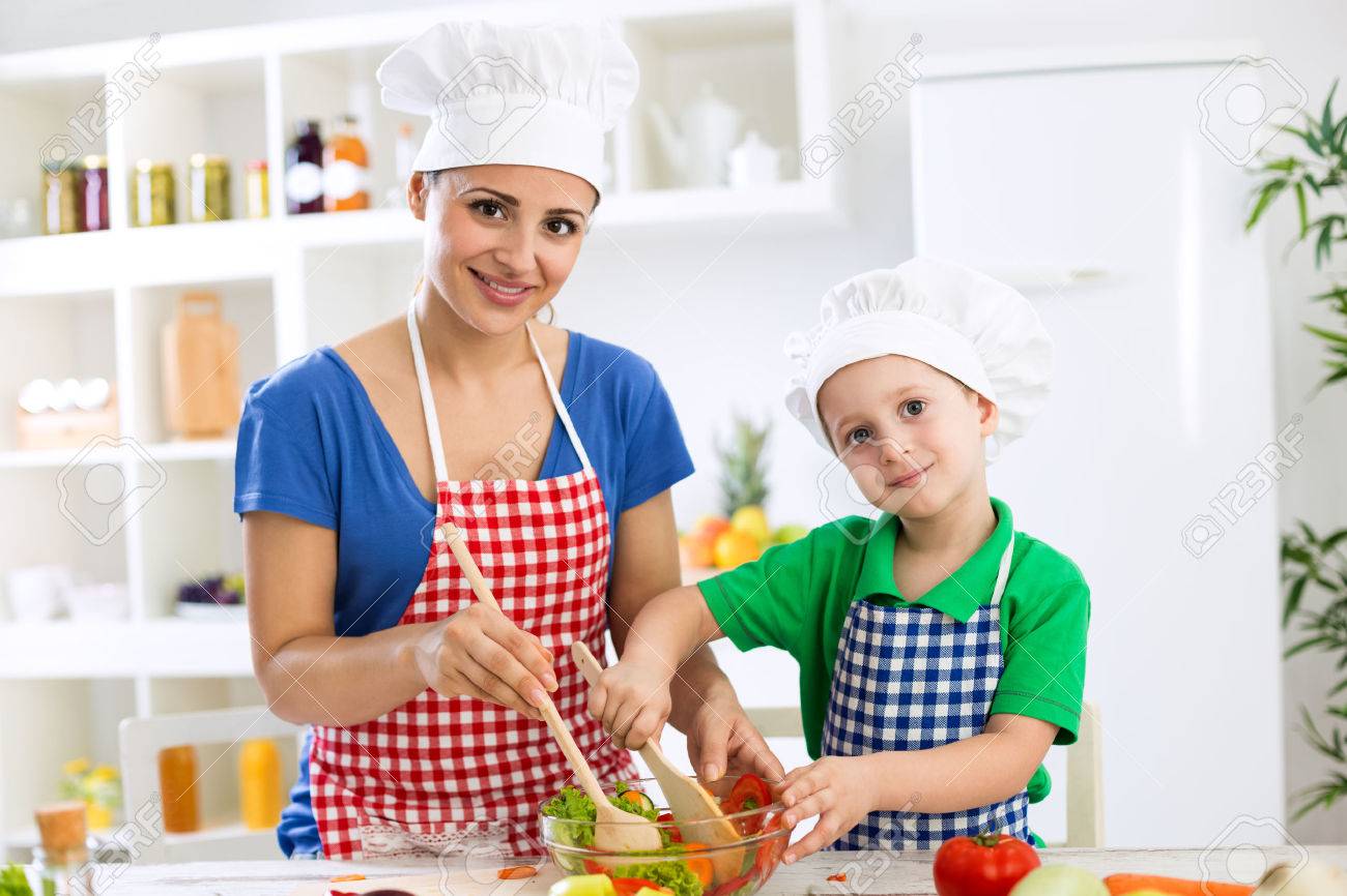 47719216-mother-and-child-cooking-together-with-scoops